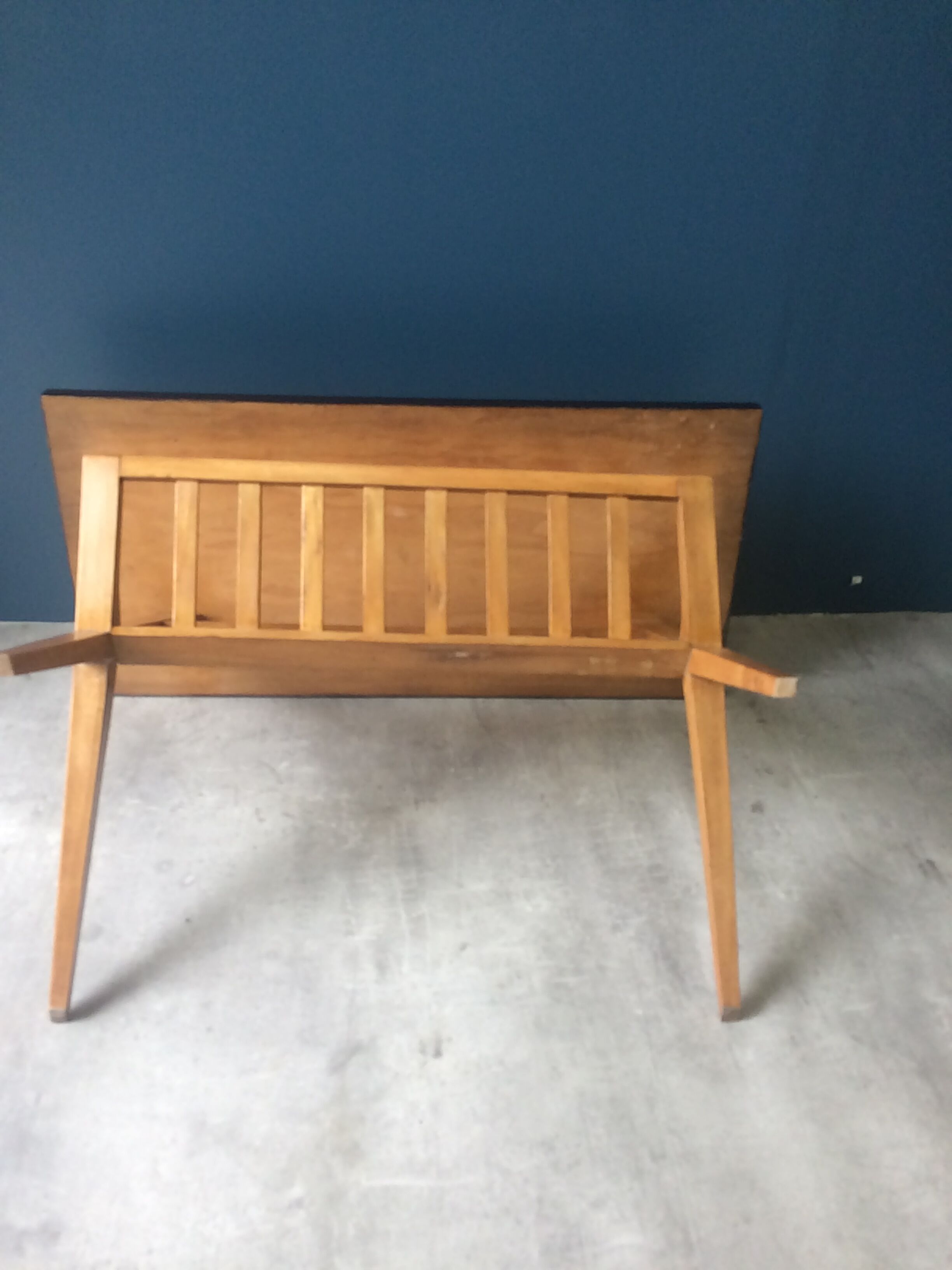 Coffee table, magazine rack with compass feet