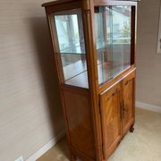 Louis XV style display cabinet, glass doors and chevron panels.