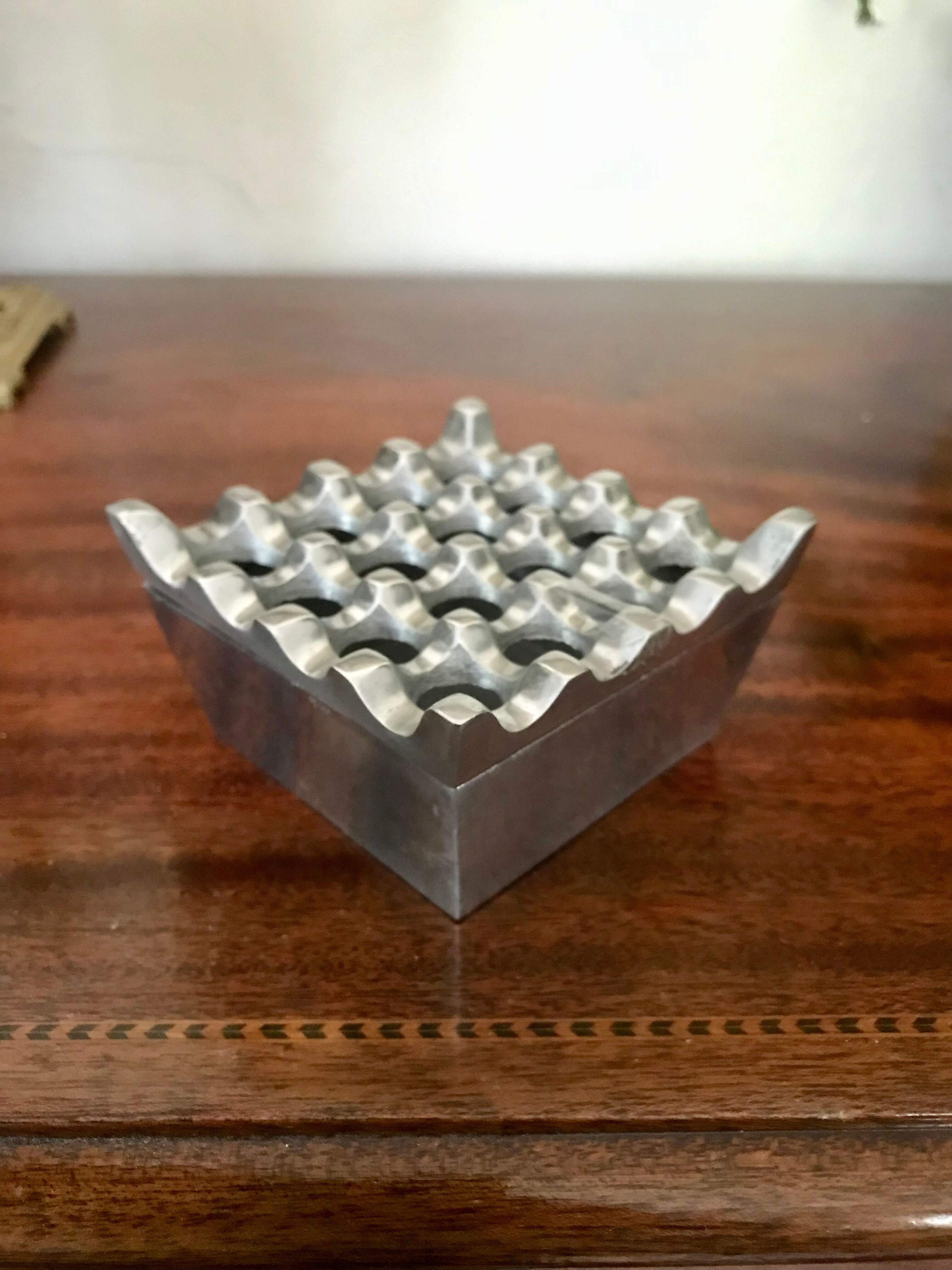 Design ashtray in cast aluminum