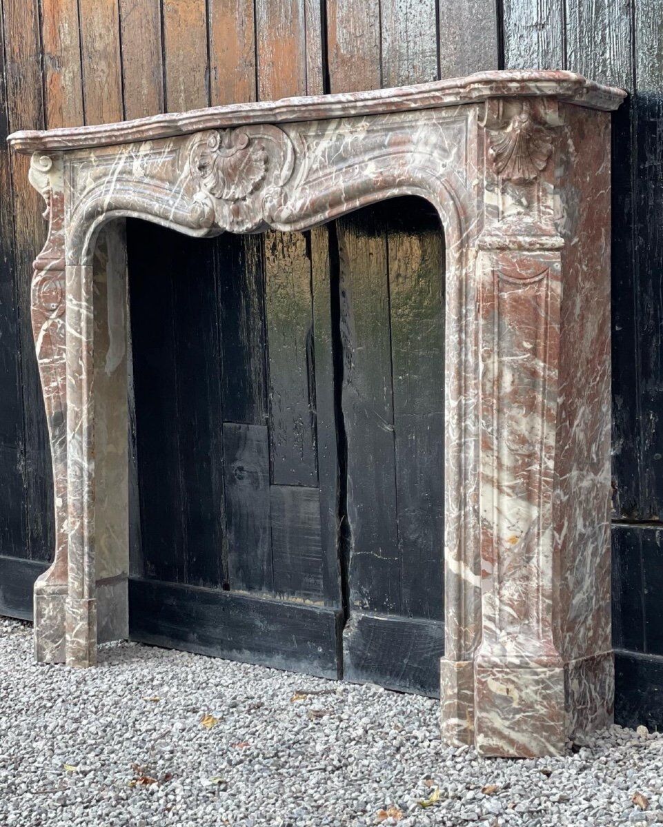 Louis XV style fireplace in grey marble from the Ardennes circa 1880