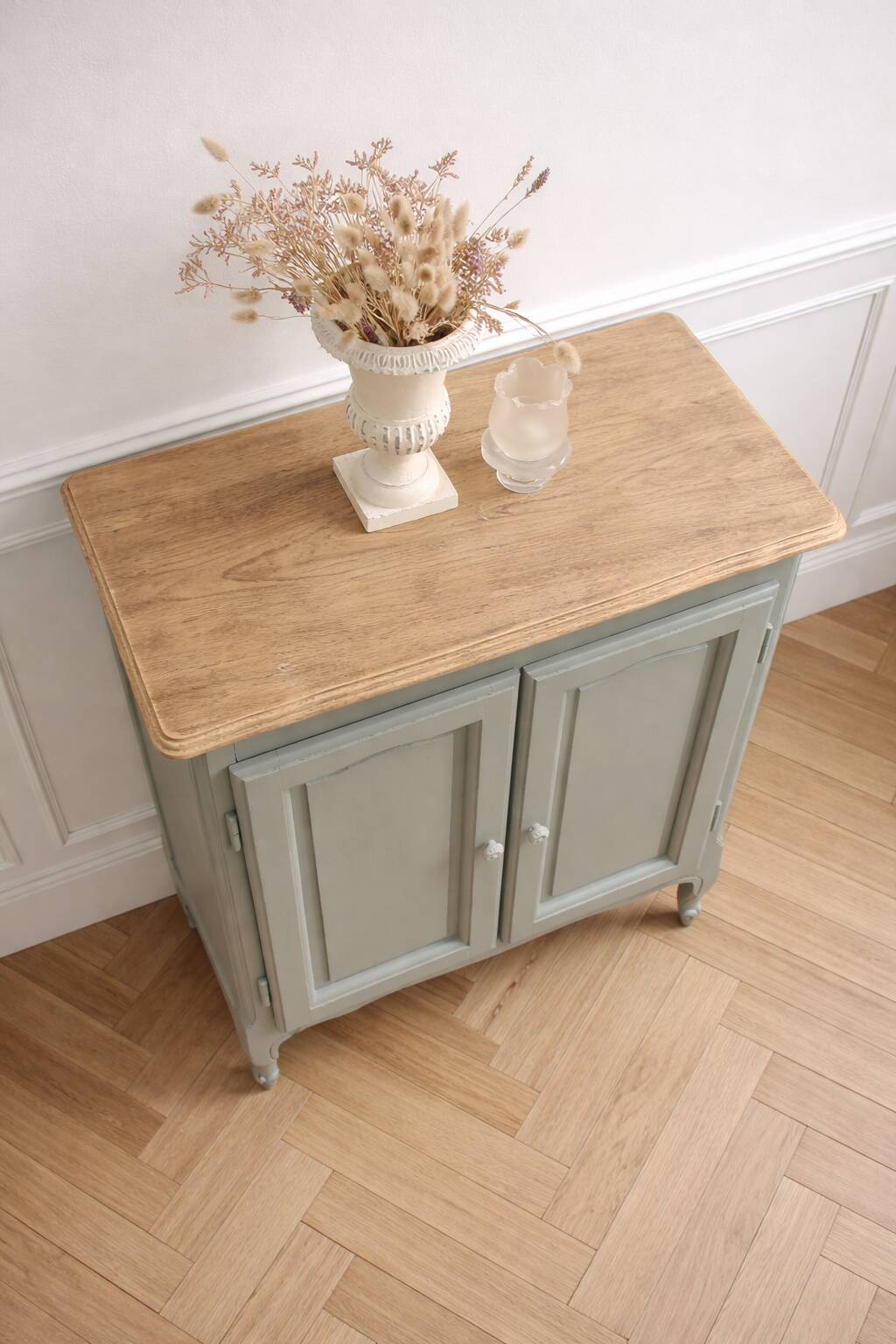Small vintage piece of furniture with a shallow depth, re-enchanted in grey-green.