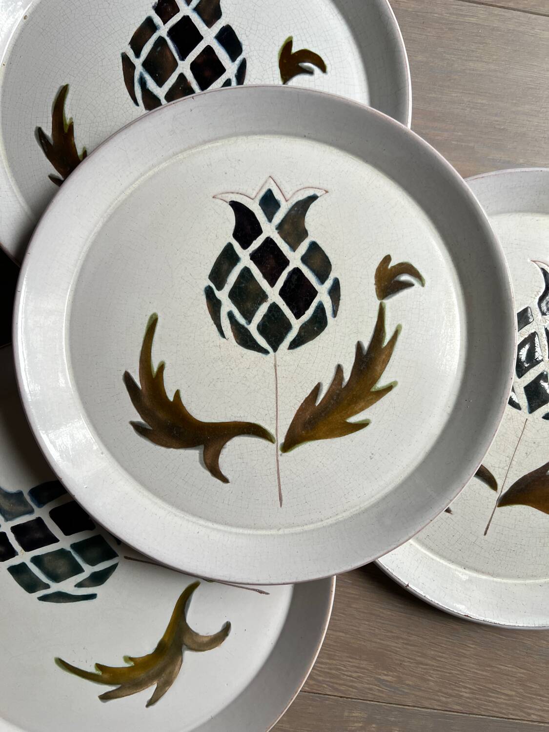 4 dessert plates signed Pornic