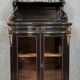 Curved "Boulle" display case from the Napoleon III period in blackened and gilded wood