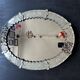 Antique oval Venetian mirror in engraved glass, Murano early 20th century.