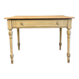 Old farmhouse table with central drawer