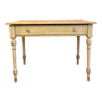 Old farmhouse table with central drawer