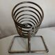 Spring bottle holder in silver metal 1970