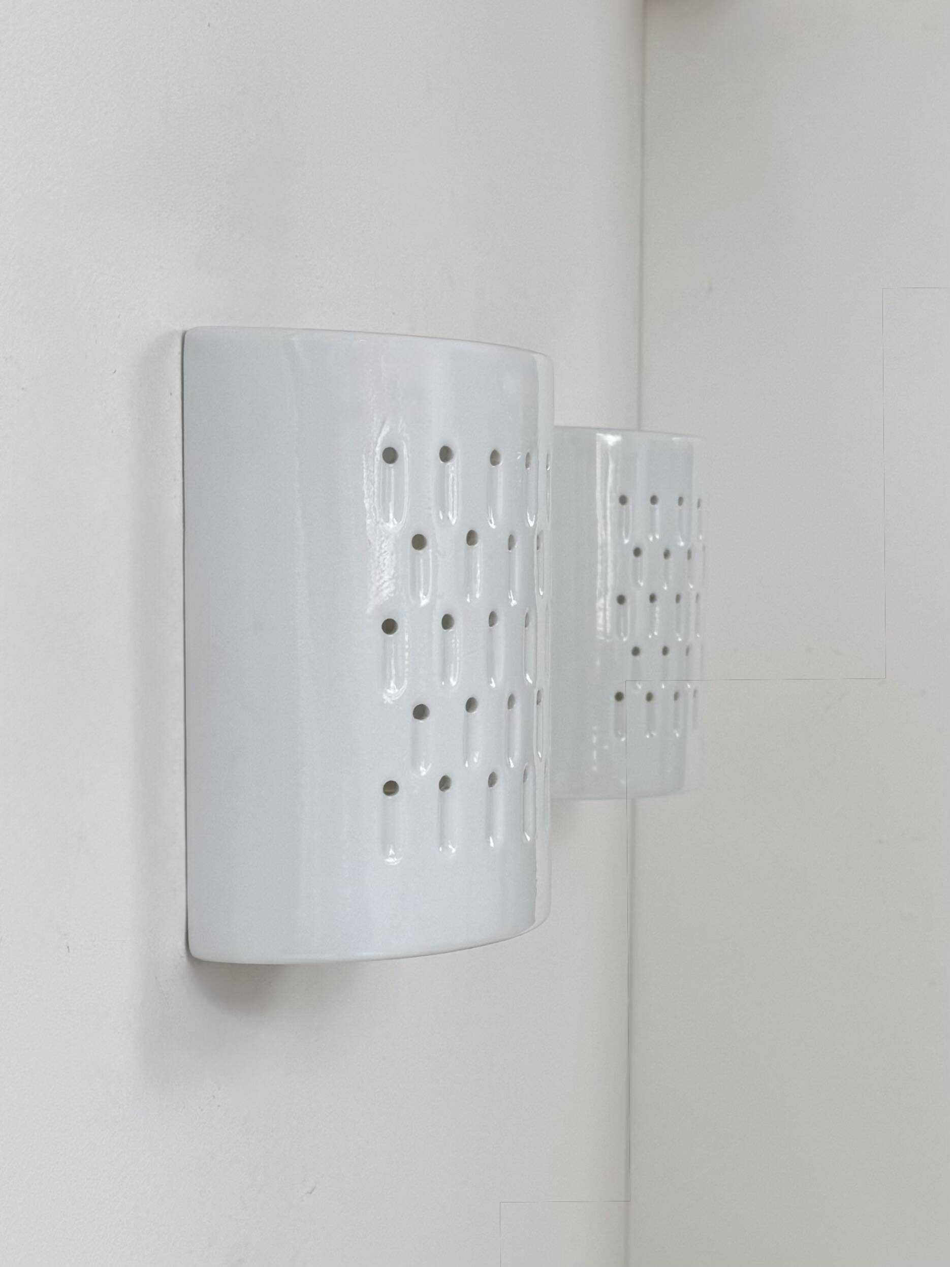 Pair of vintage wall lights in white porcelain, France, 1980.