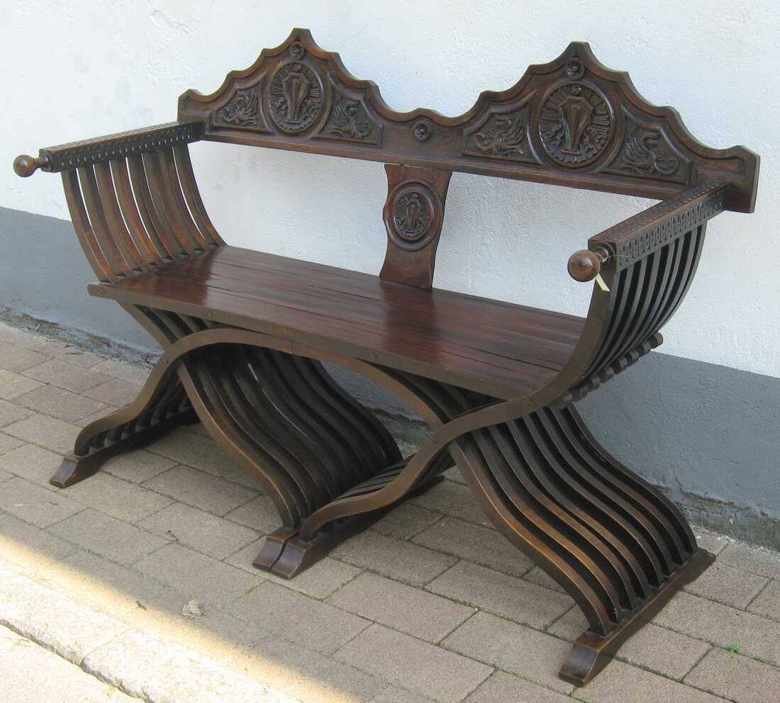 Restored antique Savonarole canapé with wax and yellow lacquer.