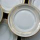 11 Dessert Plates in White Porcelain and Art Deco Gold