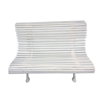 Old garden bench, cast iron feet and white wooden slats