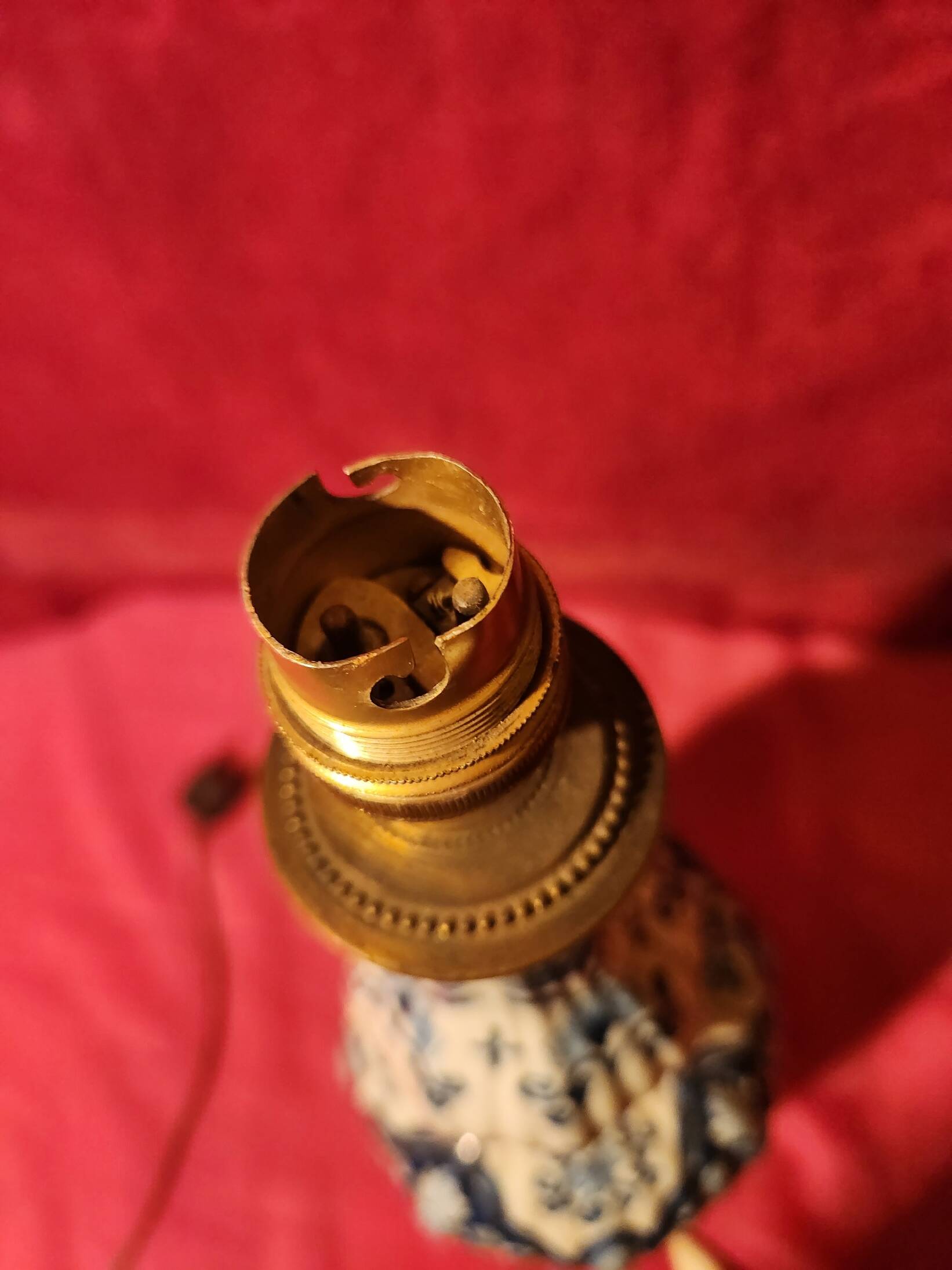 Antique ceramic lamp with brass or bronze base from the attic