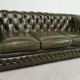 Three-seater green leather Chesterfield sofa