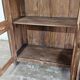 Antique glass-fronted buffet in Burmese teak
