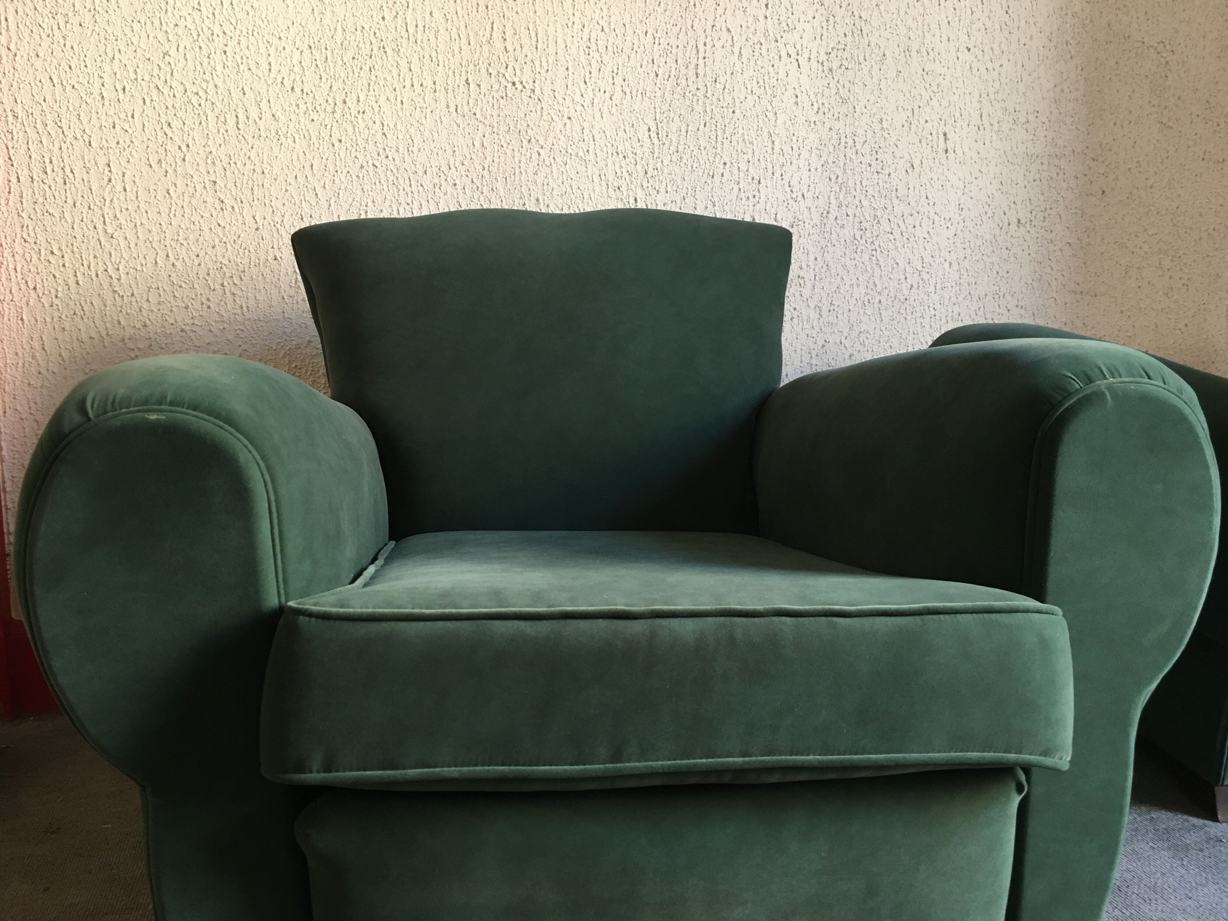 Pair of club armchairs with mustache