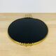 Black plateau and gilded brass from the 1950s.