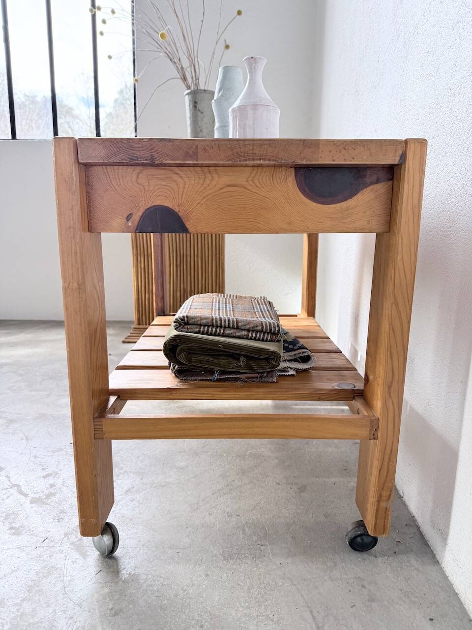 1980 pine wheeled console table