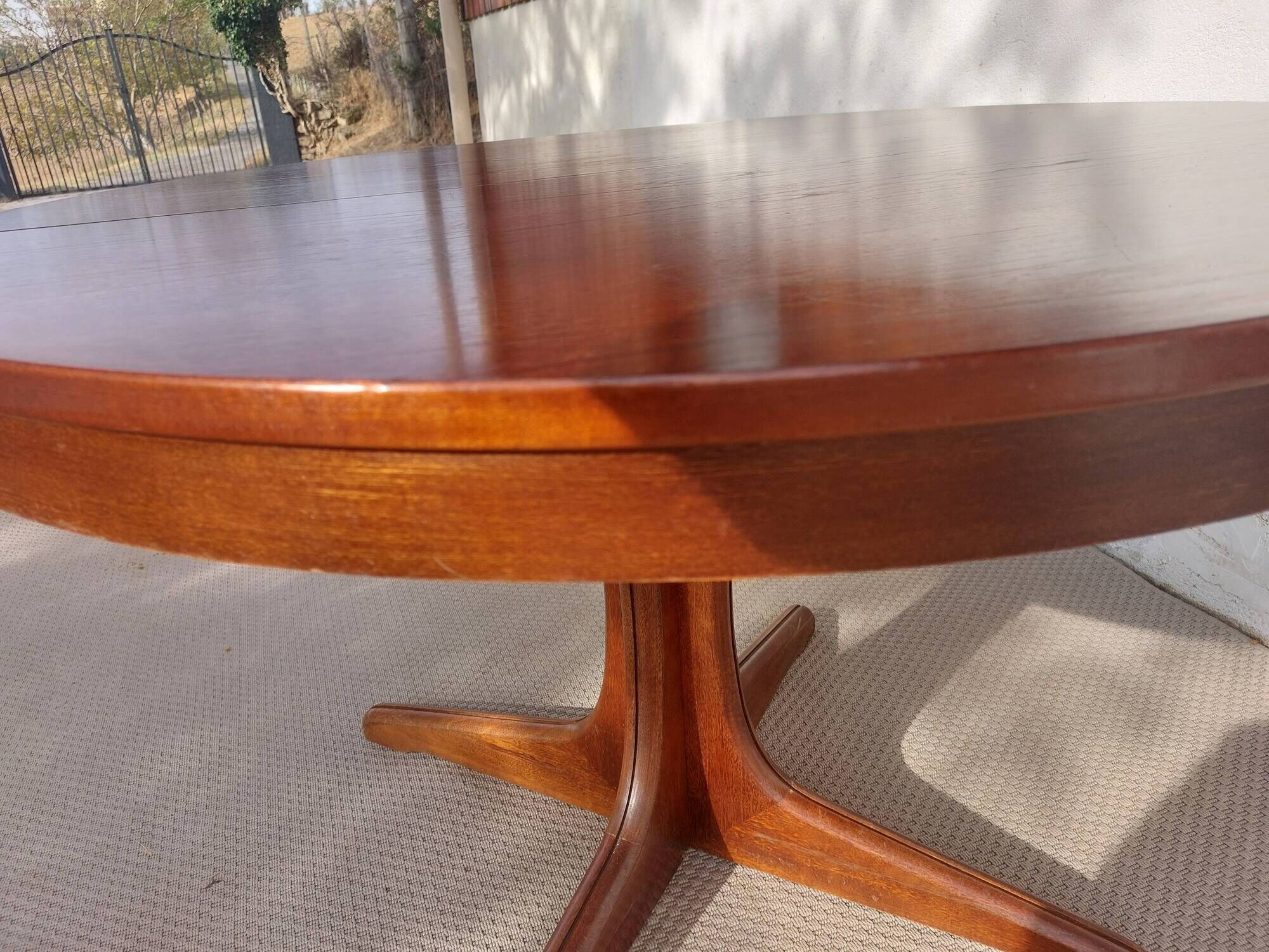 round/oval table with extension, central leg, dark shade, Baumann design