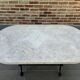 Bistro table in cast iron and marble from the art nouveau period.