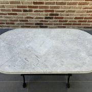 Art Nouveau cast iron and marble bistro table.