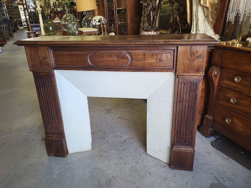 Facade of antique wooden fireplace