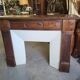 Facade of antique wooden fireplace