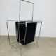 Chrome and black leather magazine rack, 1970s.