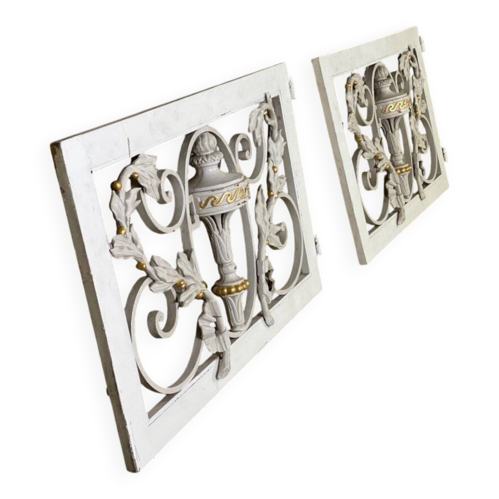 Pair of cast iron window shutters in Louis XVI style.