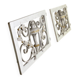 Pair of cast iron window shutters in Louis XVI style.