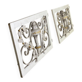 Pair of cast iron window shutters in Louis XVI style.