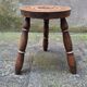 Turned wooden tripod stool