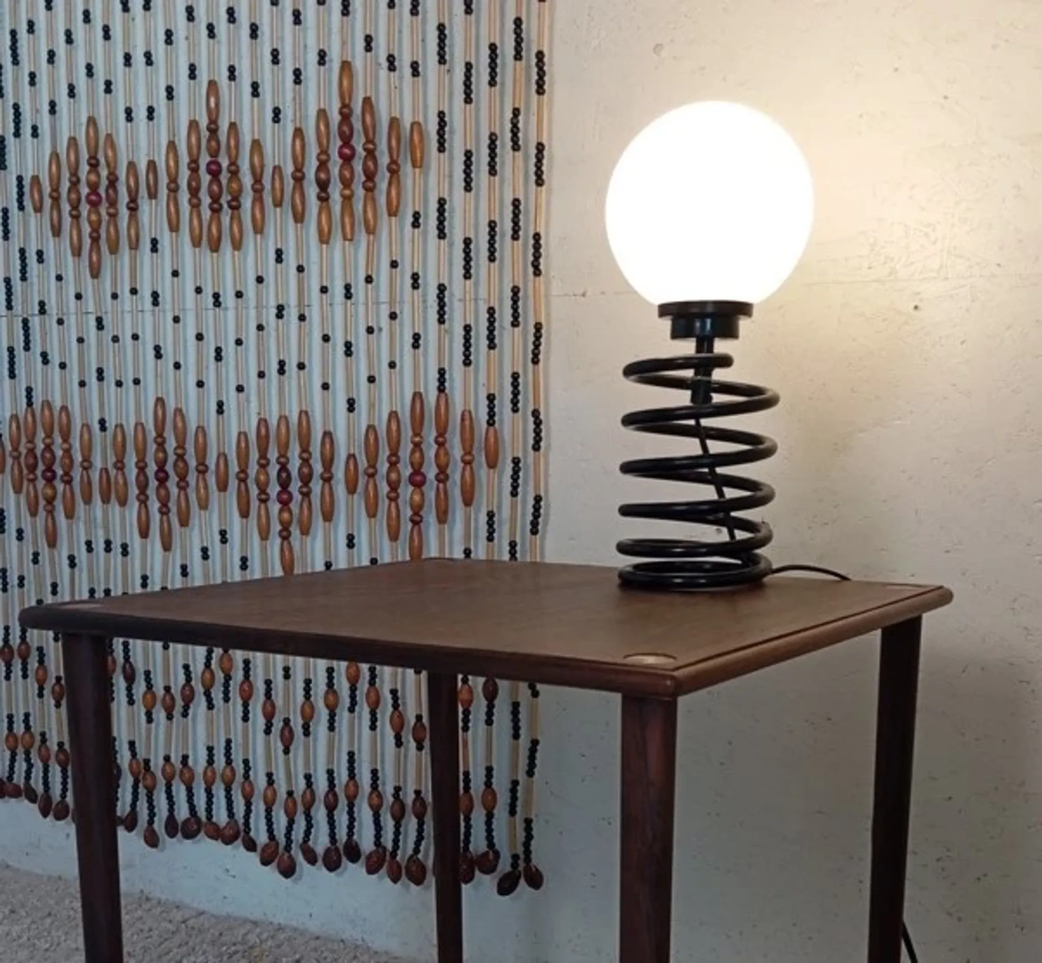 Spring lamp from the 1980s, design by Ingo Maurer.