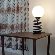 Spring lamp from the 1980s, design by Ingo Maurer.