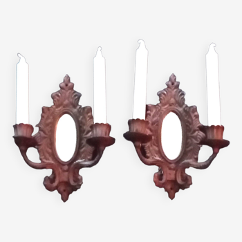 Pair of cast iron candle wall sconces with mirrors