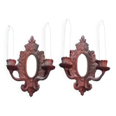 Pair of cast iron candle wall sconces with mirrors