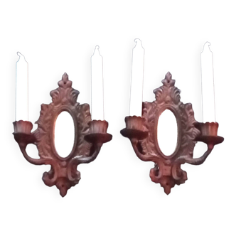 Pair of cast iron candle wall sconces with mirrors