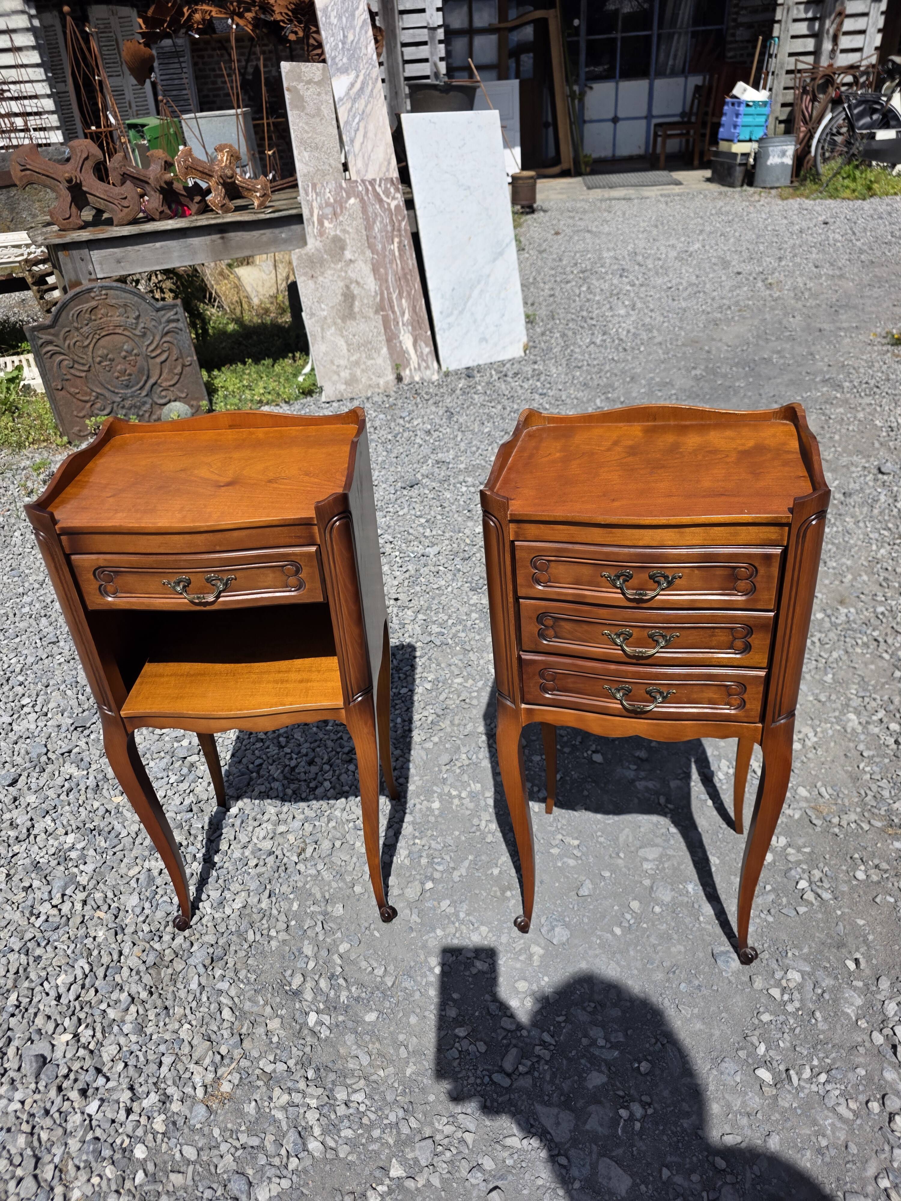Pair of Louis XV style bedside tables in cherry wood.