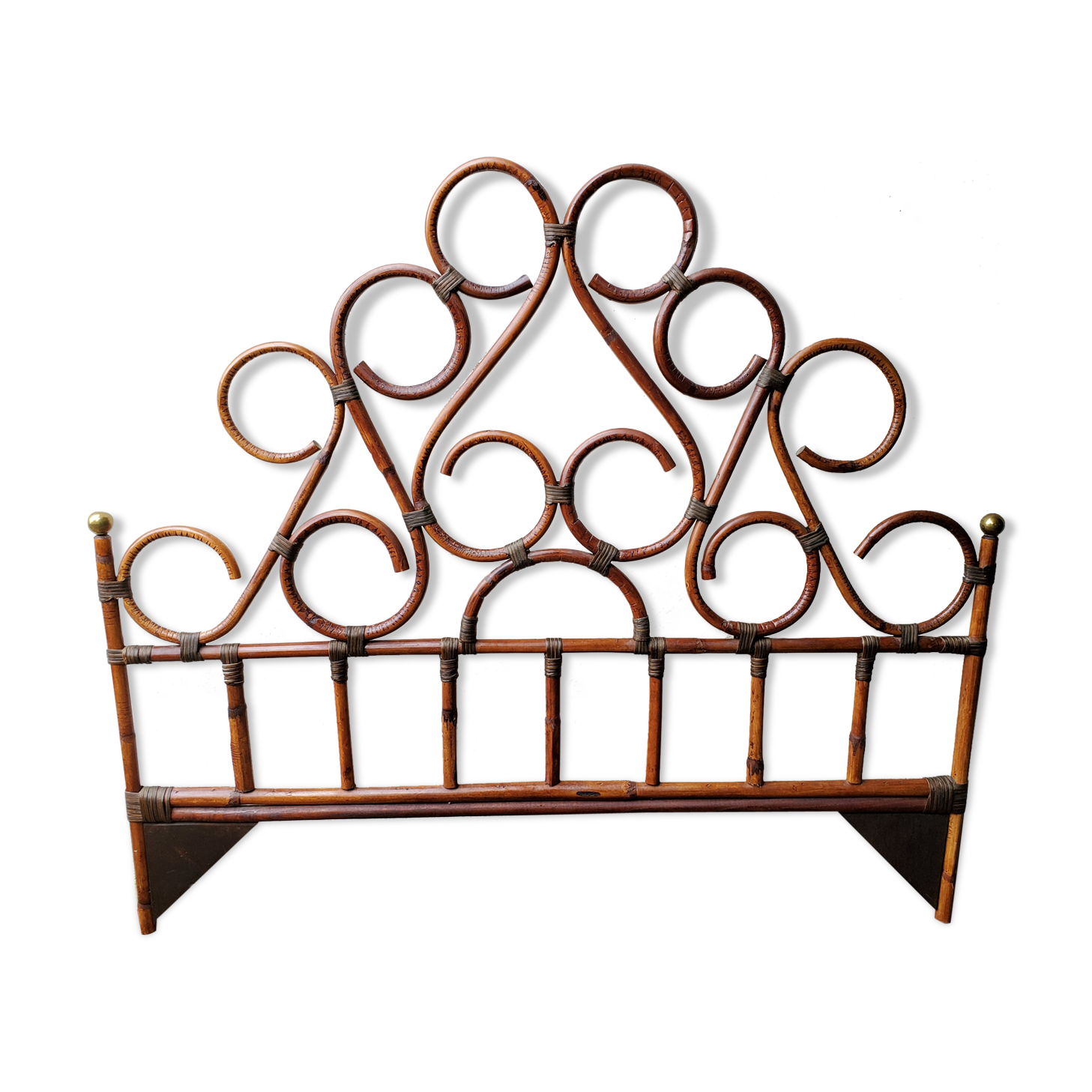 Rattan and brass headboard