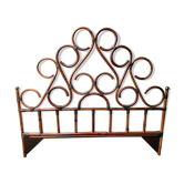 Rattan and brass headboard