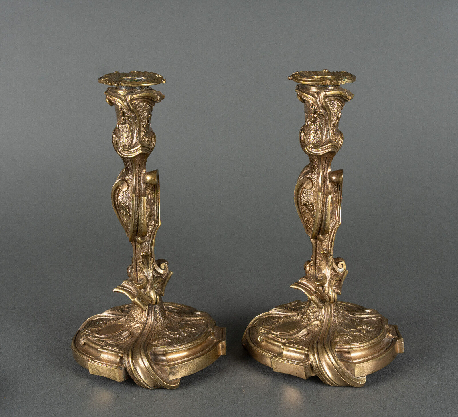 Pair of candlesticks xixth louis xiv ornamentation shells gilded bronze