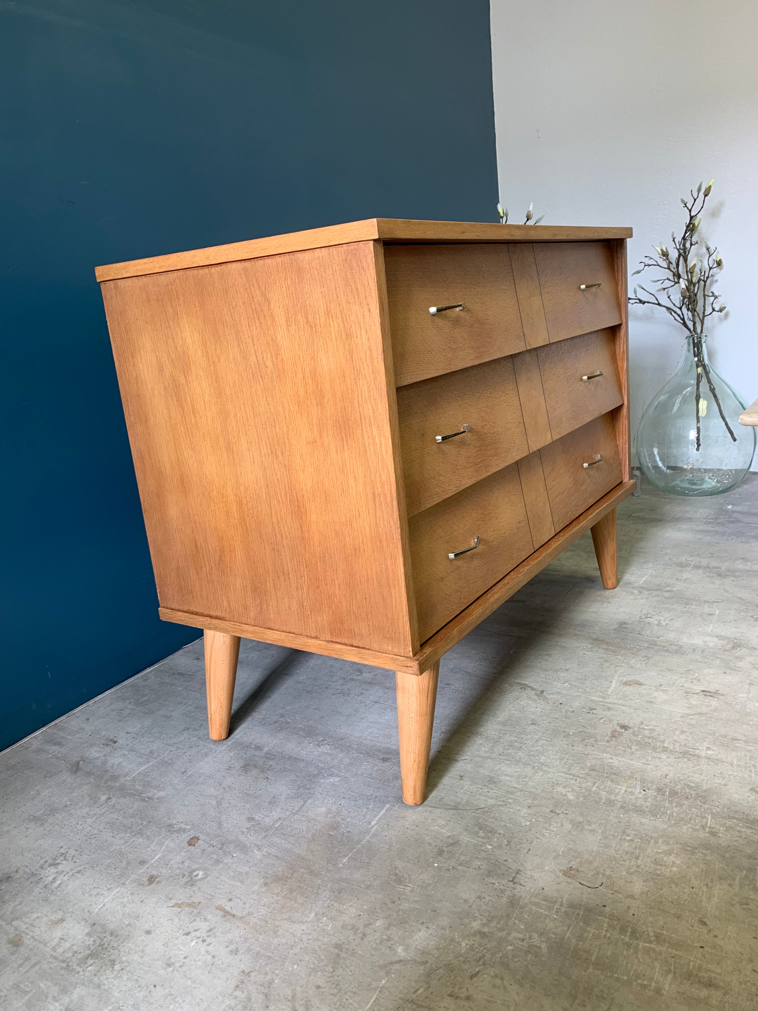 Vintage chest of drawers with wing drawers