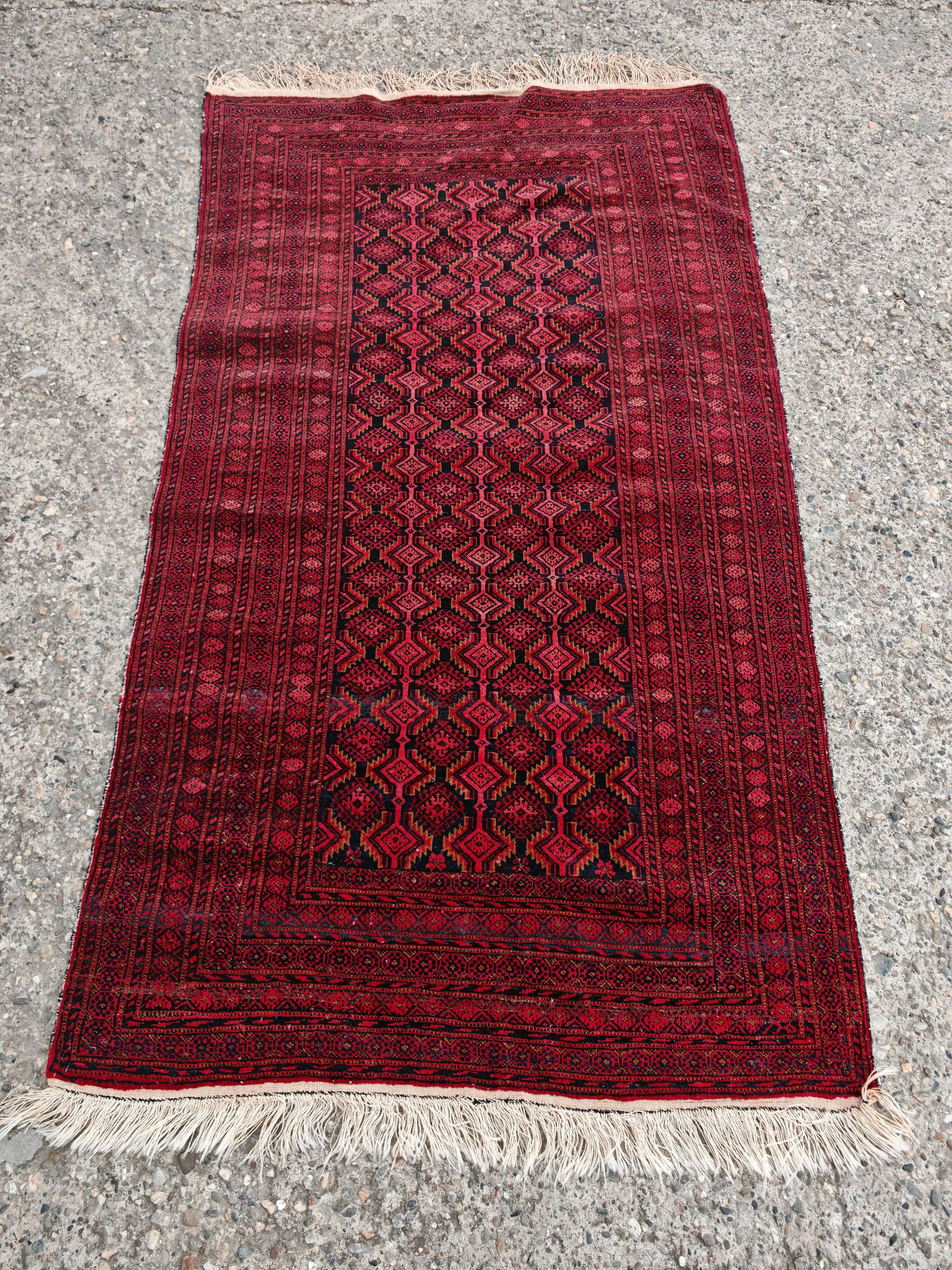 Vintage Baluch carpet handmade from natural wool, Afghanistan 1960.