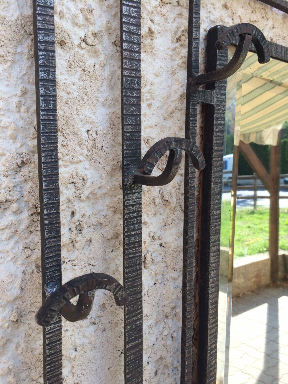 Old Art Deco coat rack in hammered iron