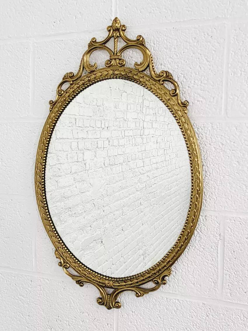 Miroir ovale ancien type médaillon sur cadre laiton