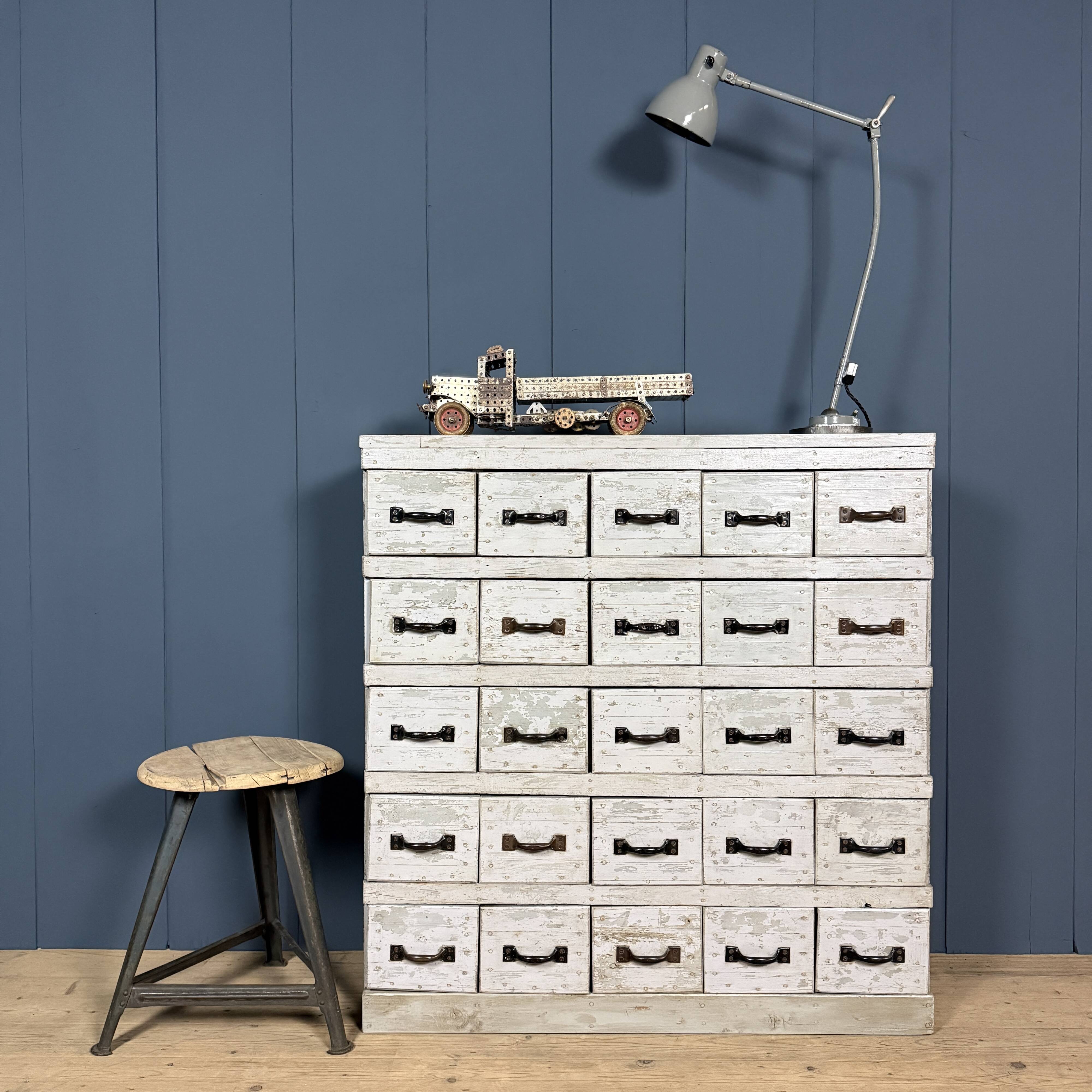 Old light grey workshop drawer cabinet with 25 drawers