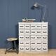 Old light grey workshop drawer cabinet with 25 drawers