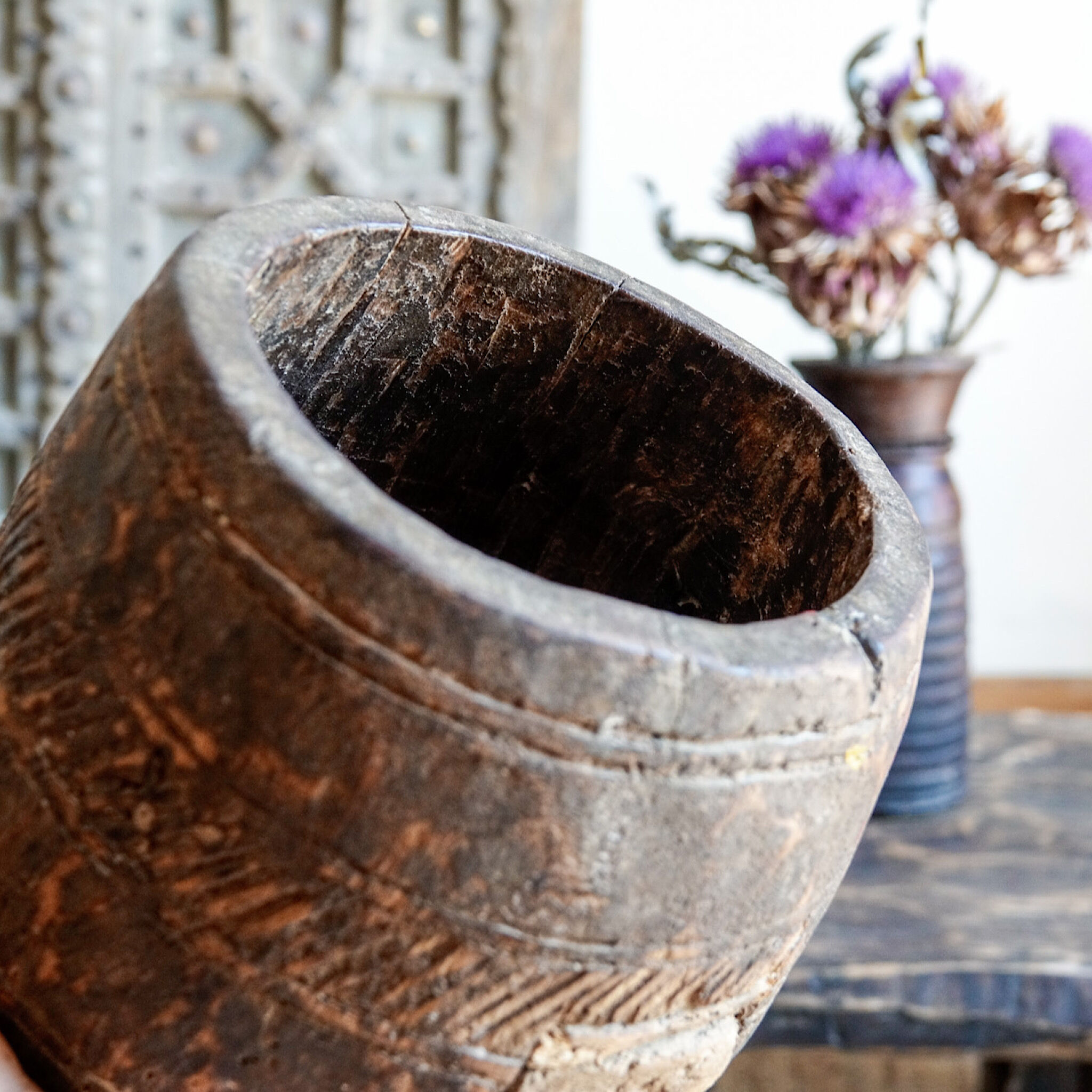Old pot carved in wood