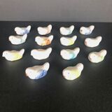 14 vintage porcelain bird knife holders