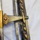 Vintage Art Deco wall-mounted coat and hat rack.