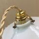Pair of pendants in white opaline and transparent serrated edges